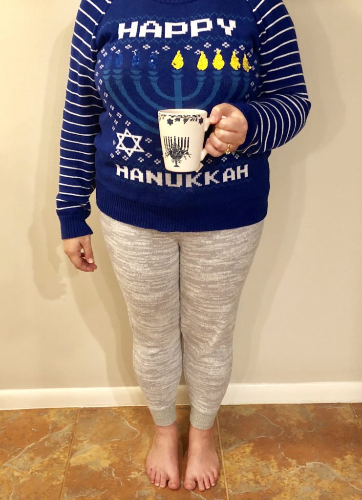 Hanukkah sweater with gray sweatpants