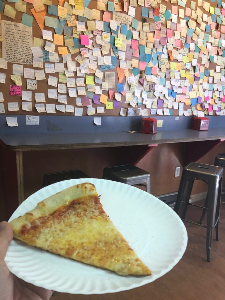 a slice of cheese pizza from Rosa's Pizza Philadelphia