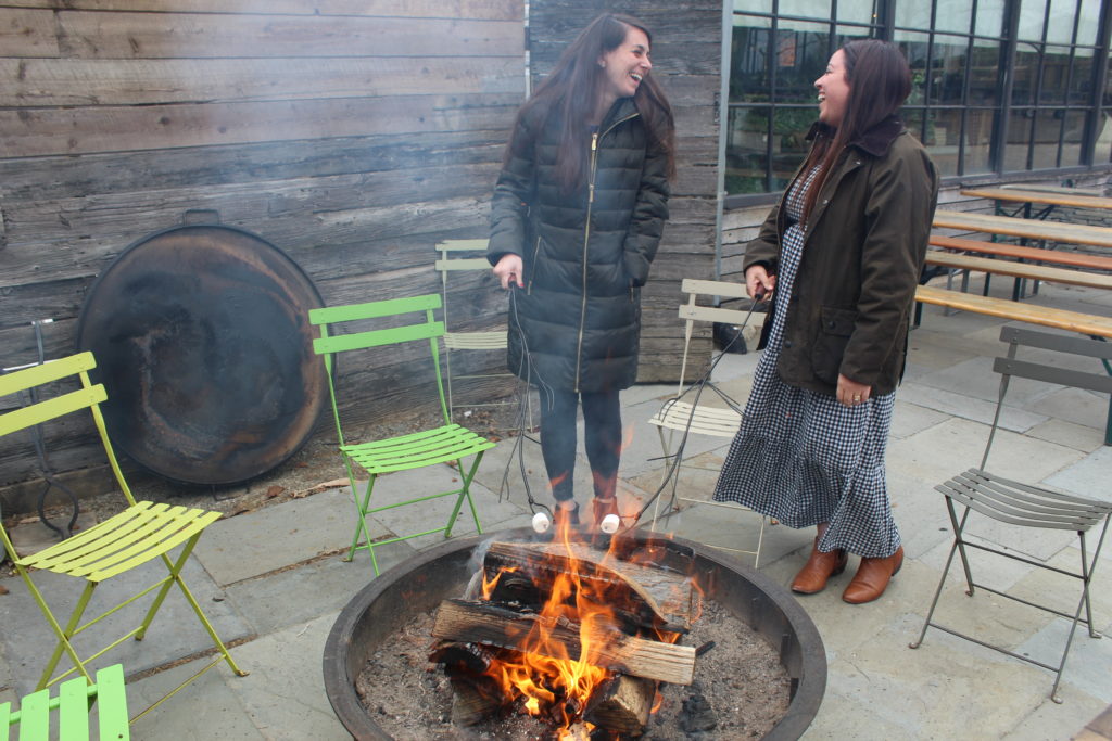 laughing while making smores after lunch at Terrain Cafe
