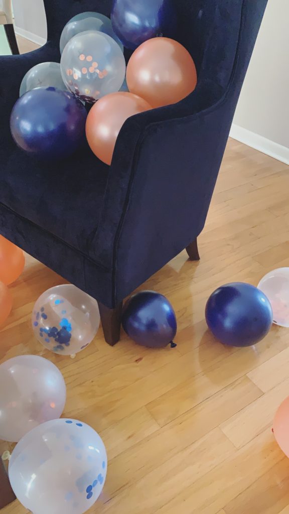 Navy blue and pink gender reveal decoration balloons