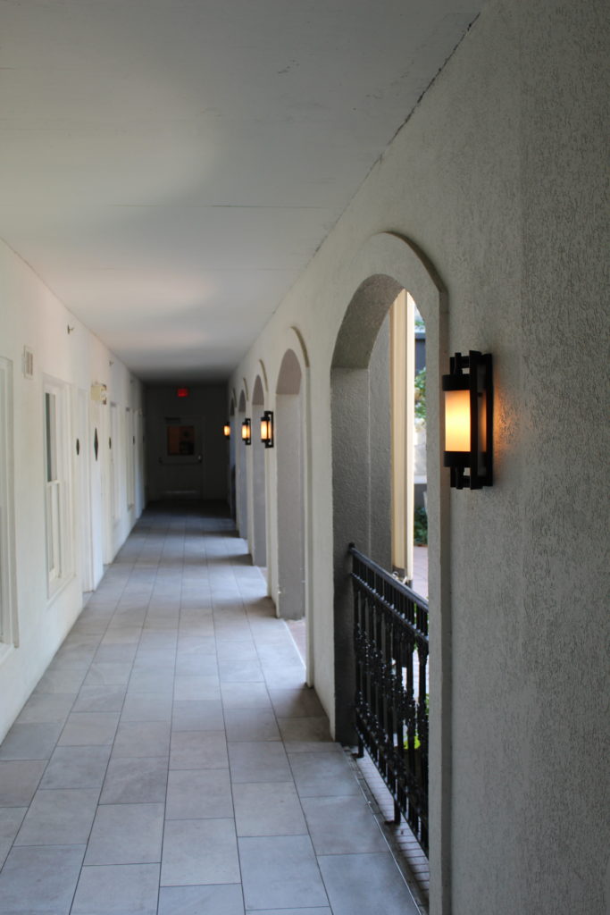 outdoor hallway in the Kimpton Brice Hotel in Savannah
