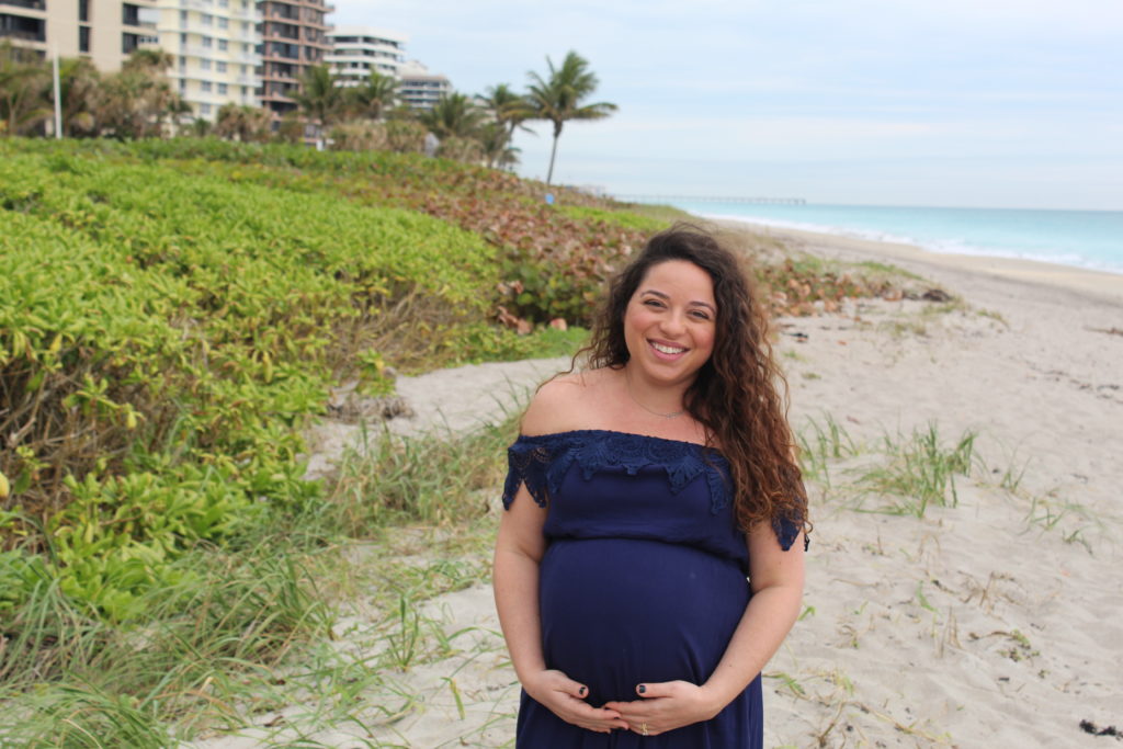 close up picture on the beach pregnant