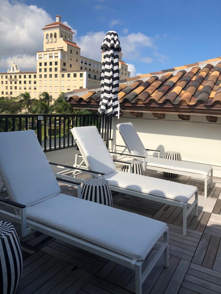 private patio lounge chairs at white elephant palm beach