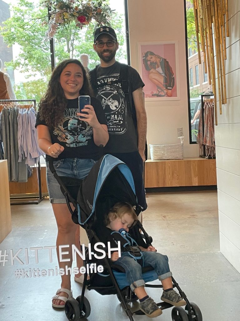 family selfie inside kittenish store in Nasvhville